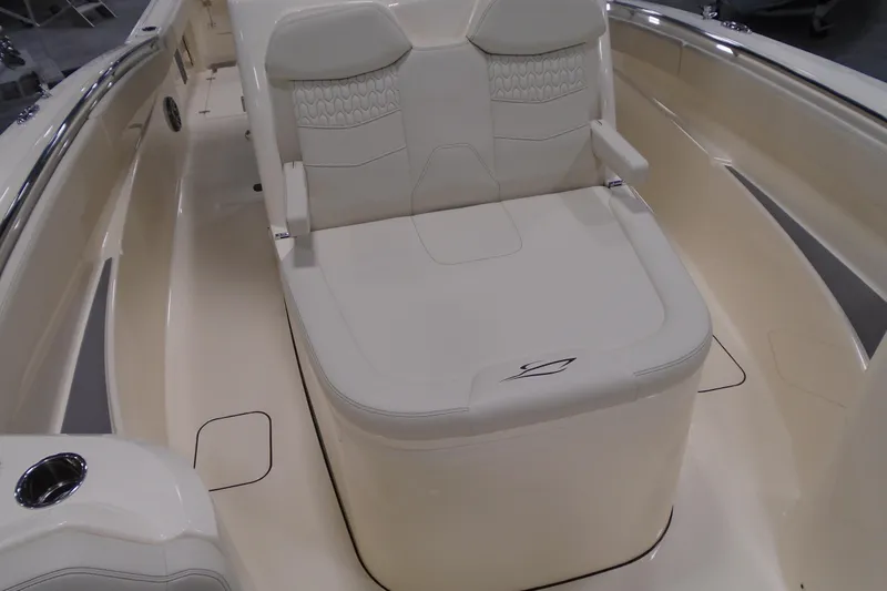 Slide: The Image of 2026 Scout 288 LXF boat interior with luxurious seating and sleek design. - 22