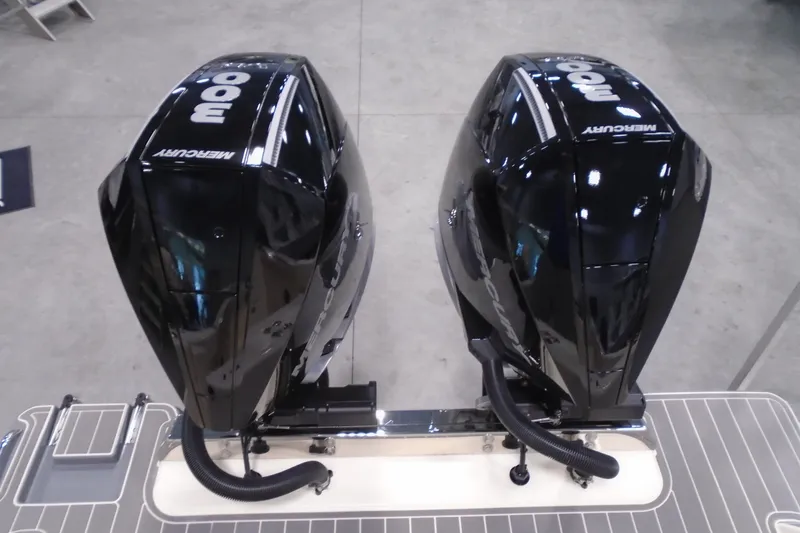 Slide: The Image of Twin Mercury 300 outboard engines on a 2026 Scout 288 LXF boat. - 8