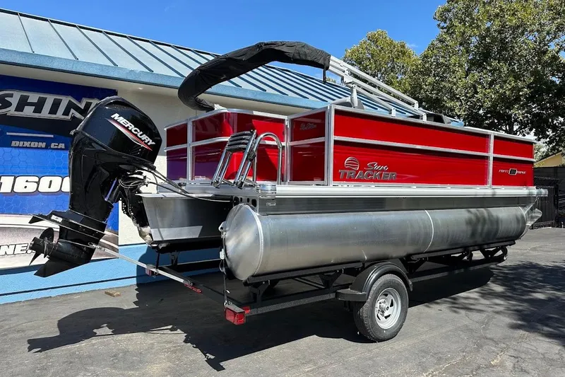 Slide: The Image of 2026 Sun Tracker Party Barge 18 DLX pontoon boat with Mercury outboard motor. - 7