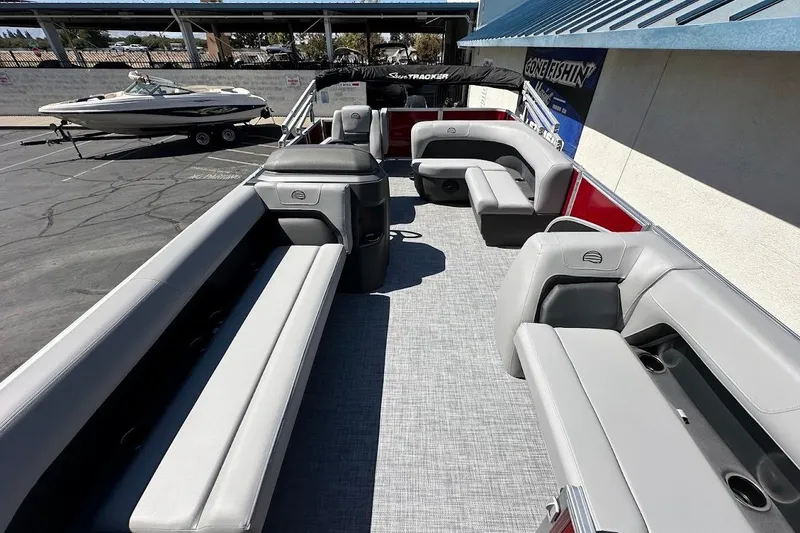 Slide: The Image of 2026 Sun Tracker Party Barge 18 DLX with spacious seating and modern design. - 9