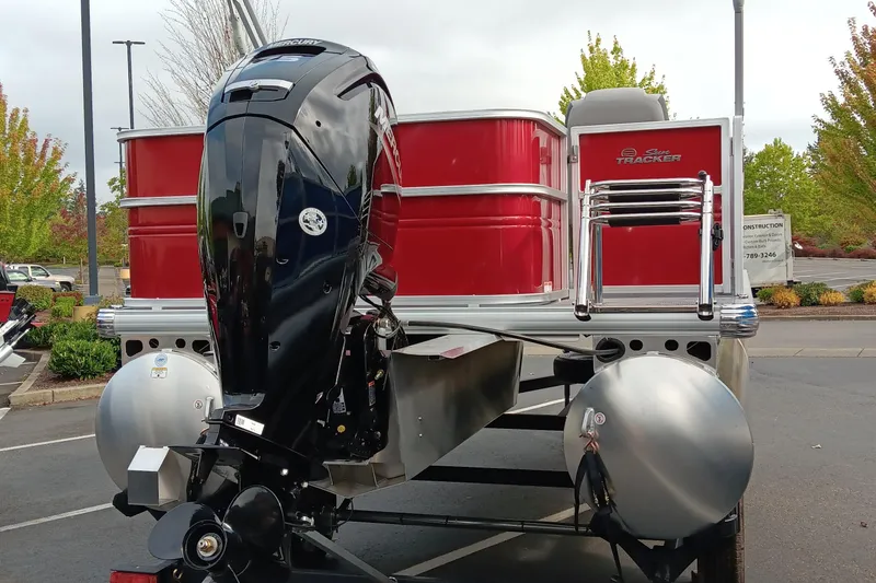 Slide: The Image of 2026 Sun Tracker Party Barge 18 DLX pontoon boat with powerful Mercury outboard engine. - 80