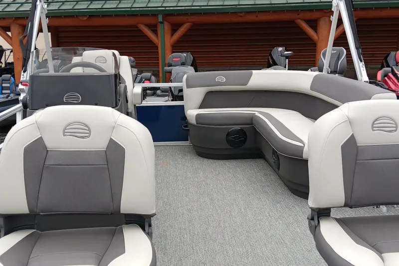 Slide: The Image of 2026 Sun Tracker Bass Buggy 16 XL Select interior with gray seating and modern design. - 3