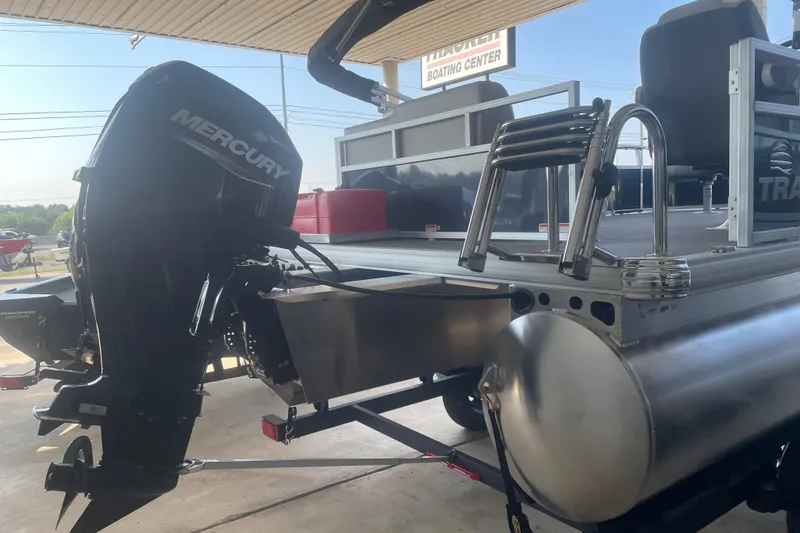 Slide: The Image of 2026 Sun Tracker Bass Buggy 16 XL Select pontoon boat with Mercury outboard motor. - 3