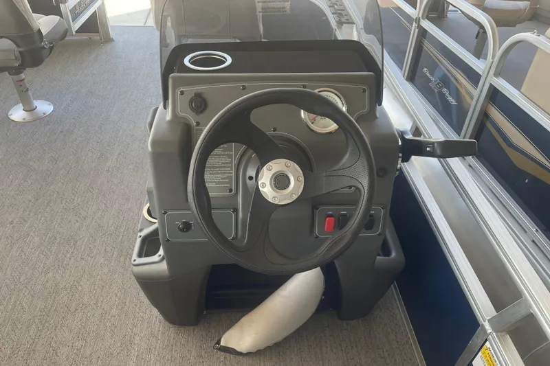 Slide: The Image of Steering console of 2026 Sun Tracker Bass Buggy 16 XL Select pontoon boat. - 7