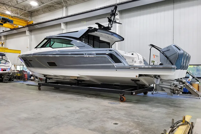 The Image of 2026 Formula 500 Super Sport Crossover boat in a warehouse setting. - 1