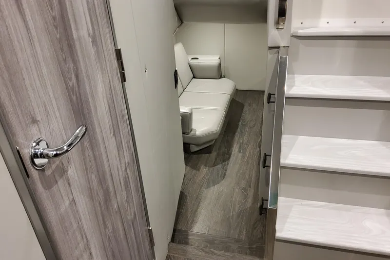 Slide: The Image of 2026 Formula 500 Super Sport Crossover interior with modern seating and sleek wooden flooring. - 10