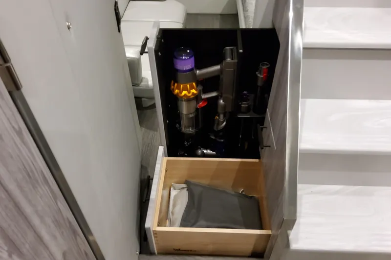 Slide: The Image of Storage compartment with vacuum cleaner in 2026 Formula 500 Super Sport Crossover. - 13