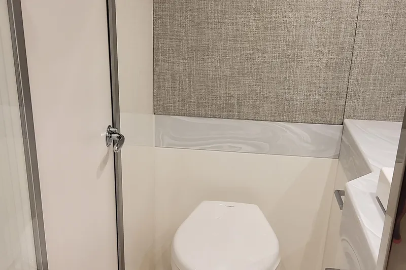 Slide: The Image of Modern bathroom in 2026 Formula 500 Super Sport Crossover boat, featuring sleek design and fixtures. - 16