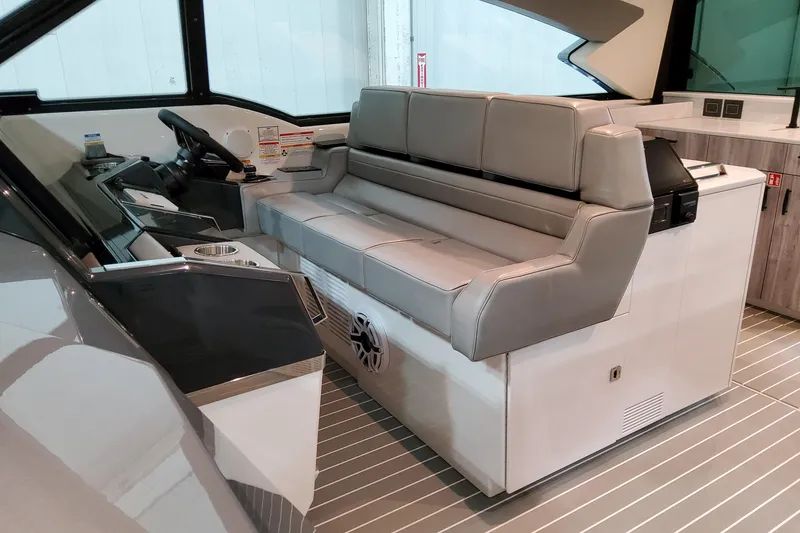 Slide: The Image of 2026 Formula 500 Super Sport Crossover interior with sleek seating and modern dashboard. - 24