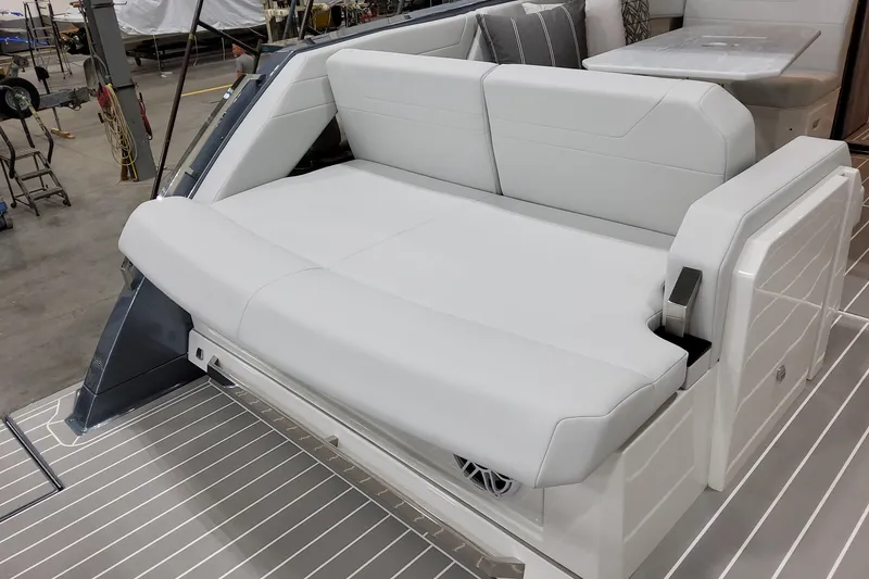 Slide: The Image of 2026 Formula 500 Super Sport Crossover boat interior with white seating and modern design. - 42