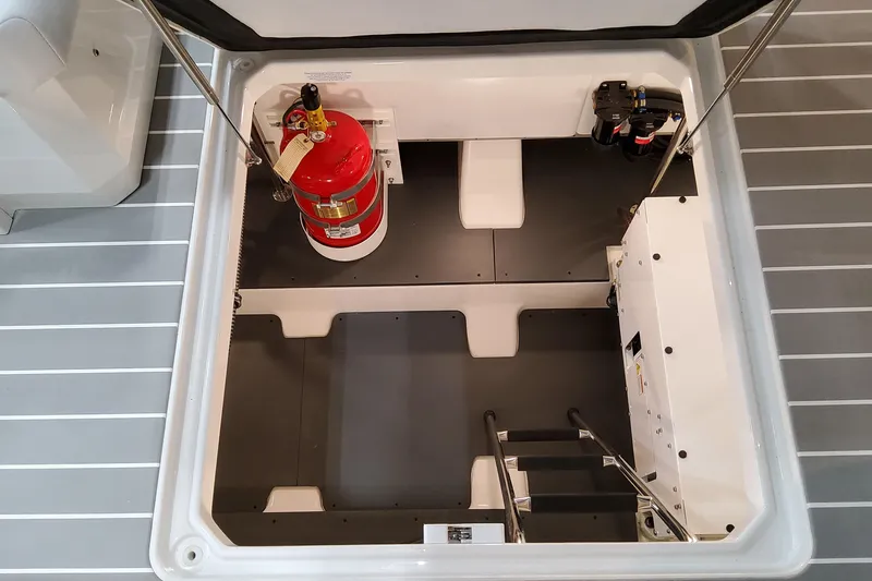 Slide: The Image of 2026 Formula 500 Super Sport Crossover engine compartment with fire extinguisher and equipment. - 46