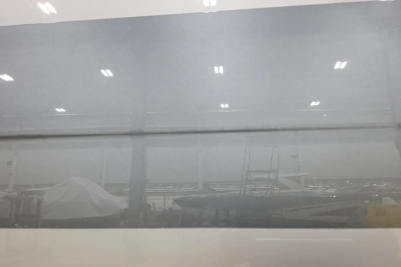 Slide: The Image of Indoor view of a 2026 Formula 500 Super Sport Crossover boat in a showroom. - 5