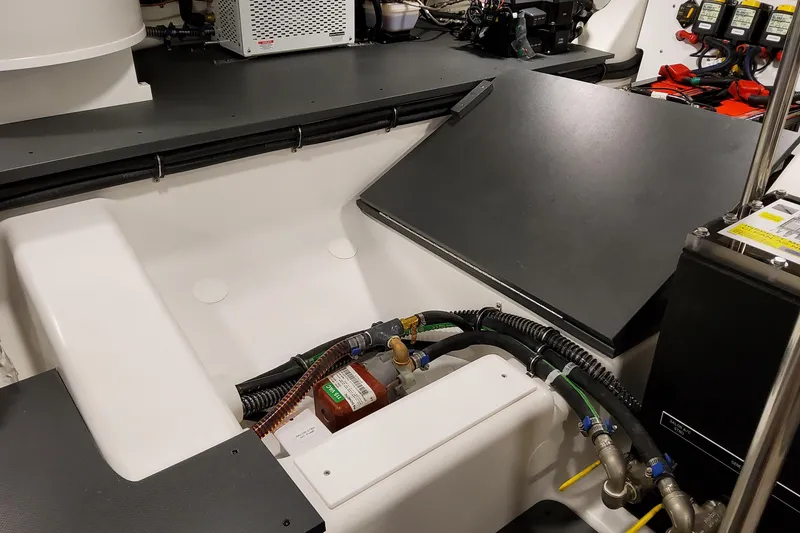 Slide: The Image of Engine compartment of 2026 Formula 500 Super Sport Crossover, showcasing mechanical components and wiring. - 51