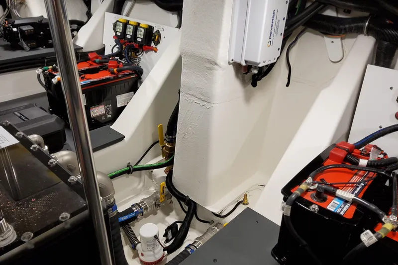 Slide: The Image of Engine compartment of 2026 Formula 500 Super Sport Crossover with batteries and wiring. - 53