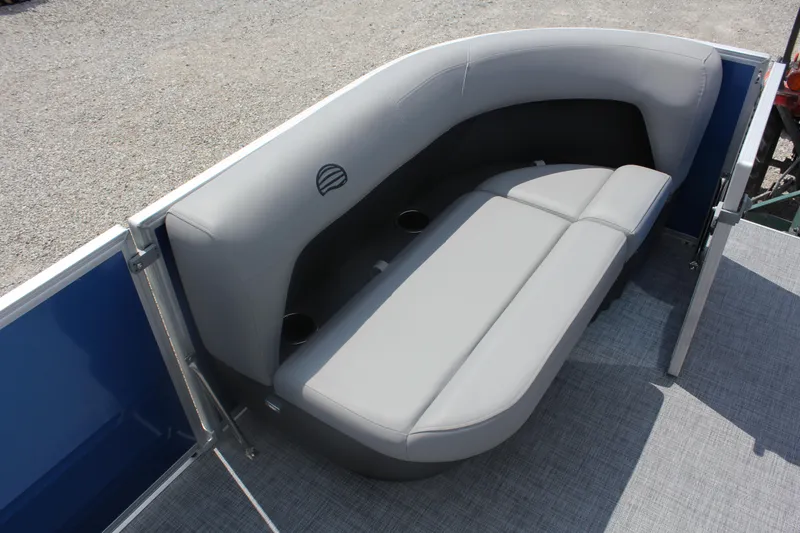 Slide: The Image of 2026 Sun Tracker Party Barge 16 DLX, gray seating area with cup holders. - 6