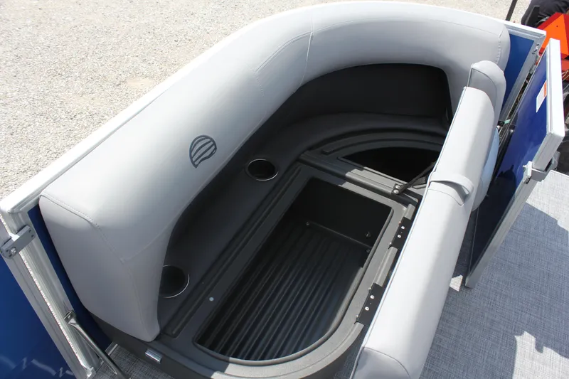 Slide: The Image of 2026 Sun Tracker Party Barge 16 DLX seating area with storage and cup holders. - 7