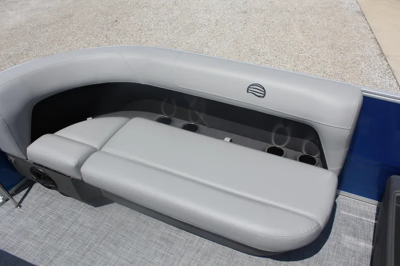 Slide: The Image of 2026 Sun Tracker Party Barge 16 DLX pontoon boat with gray seating and cup holders. - 8