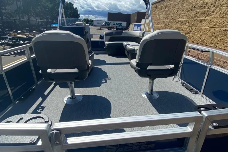 Slide: The Image of 2026 Sun Tracker Bass Buggy 16 XL Select pontoon boat interior with seating. - 4