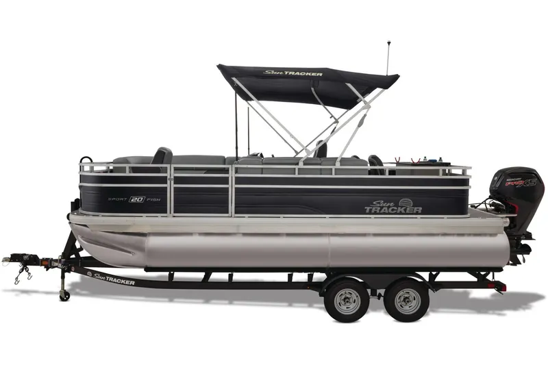 Slide: The Image of 2026 Sun Tracker SportFish 20 DLX pontoon boat interior with gray seating and helm. - 9