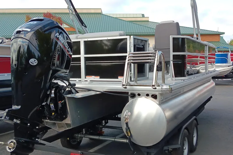 Slide: The Image of 2026 Sun Tracker Party Barge 20 DLX pontoon boat with Mercury outboard motor. - 5