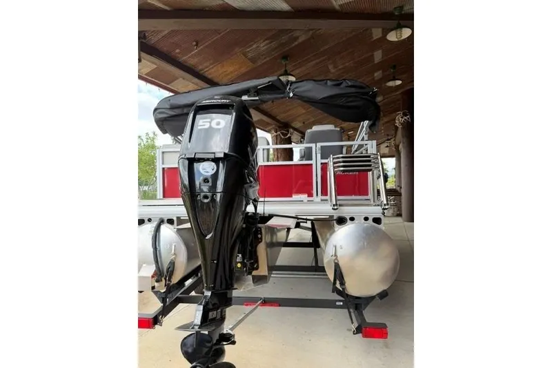 Slide: The Image of 2026 Sun Tracker Bass Buggy 16 XL Select pontoon boat with 50 HP motor. - 3