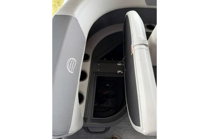 Slide: The Image of Interior storage compartment of 2026 Sun Tracker Bass Buggy 16 XL Select boat. - 14