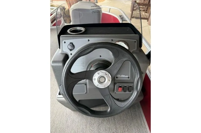 Slide: The Image of Steering console of 2026 Sun Tracker Bass Buggy 16 XL Select pontoon boat. - 11