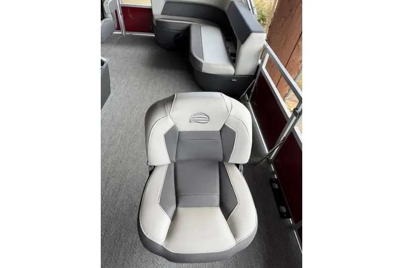 Slide: The Image of 2026 Sun Tracker Bass Buggy 16 XL Select interior with comfortable seating and modern design. - 9