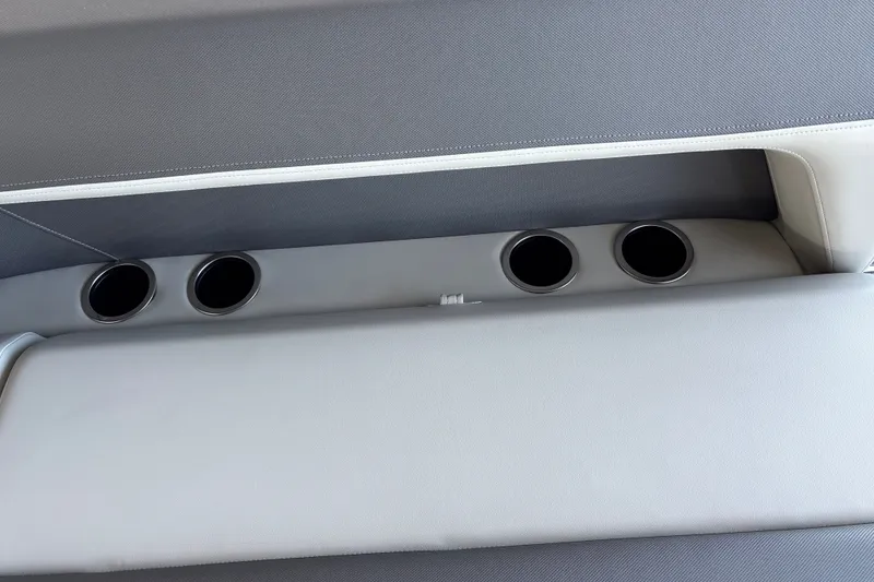 Slide: The Image of Cup holders on Sun Tracker Bass Buggy 16 XL Select 2026 boat interior. - 13
