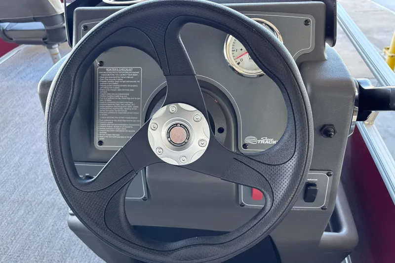 Slide: The Image of Steering wheel of 2026 Sun Tracker Bass Buggy 16 XL Select boat. - 16