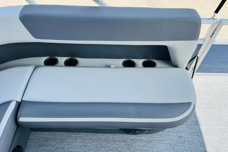 Slide: The Image of 2026 Sun Tracker Bass Buggy 18 DLX boat seat with integrated cup holders. - 25