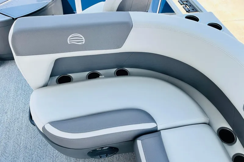 Slide: The Image of 2026 Sun Tracker Bass Buggy 18 DLX boat seating with cup holders and stylish upholstery. - 26