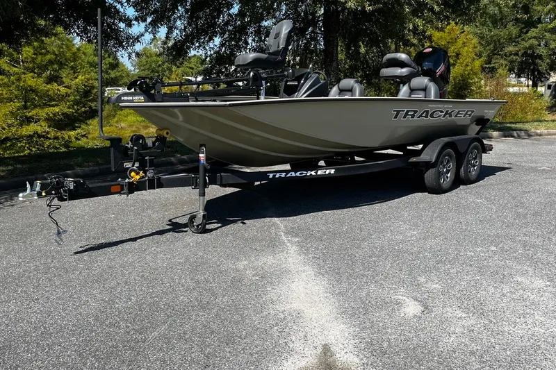 The Image of 2026 Tracker Pro Team 195 boat on trailer in outdoor setting. - 2