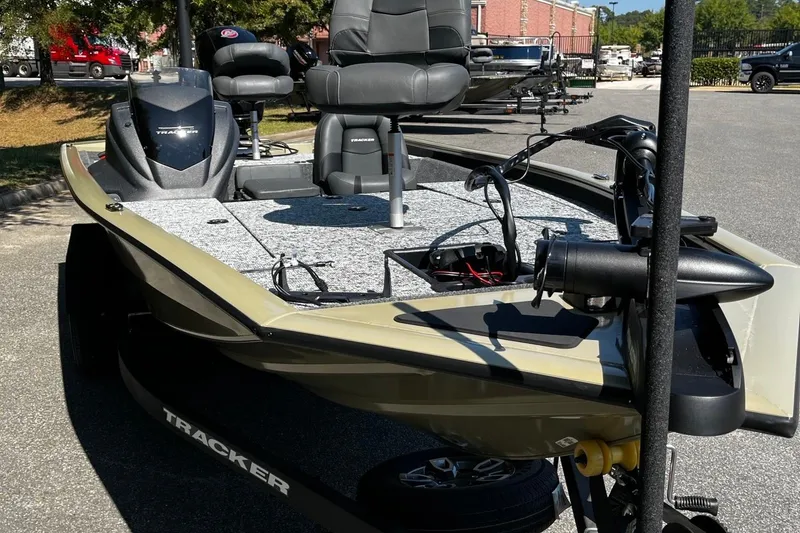 Slide: The Image of 2026 Tracker Pro Team 195 fishing boat with modern seating and equipment. - 8