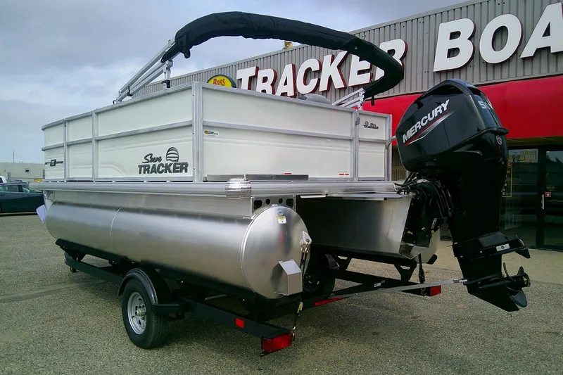 Slide: The Image of 2026 Sun Tracker Party Barge 16 DLX pontoon boat with Mercury engine at dealership. - 53