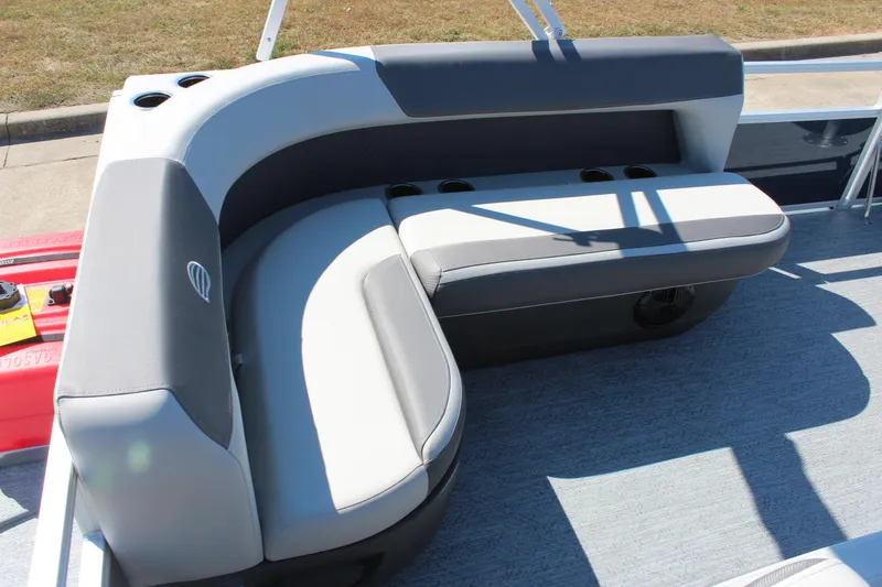 Slide: The Image of 2026 Sun Tracker Bass Buggy 16 XL Select boat seating with cup holders, gray upholstery. - 13