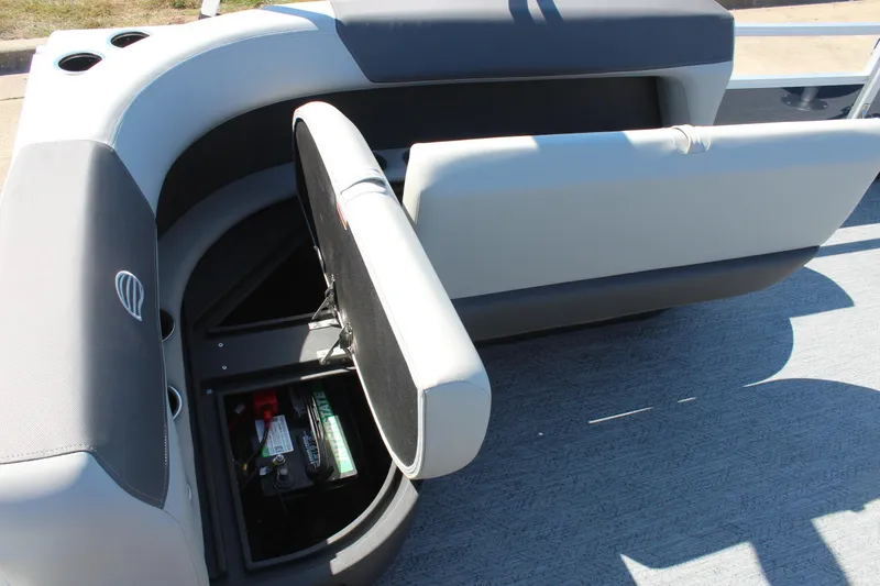 Slide: The Image of 2026 Sun Tracker Bass Buggy 16 XL Select boat seat with storage compartment open. - 15