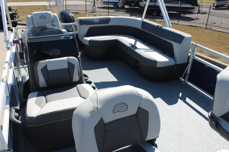 Slide: The Image of 2026 Sun Tracker Bass Buggy 16 XL Select pontoon boat interior with comfortable seating. - 19