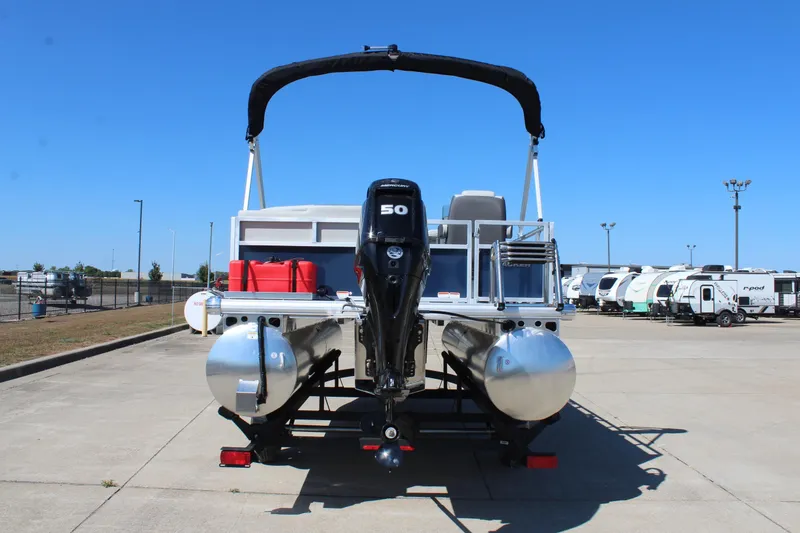 Slide: The Image of 2026 Sun Tracker Bass Buggy 16 XL Select pontoon boat with outboard motor. - 6