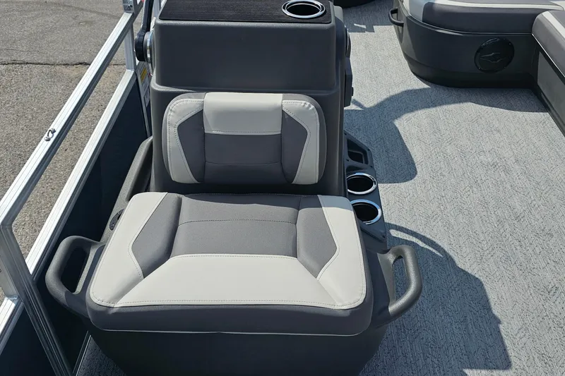 Slide: The Image of 2026 Sun Tracker Bass Buggy 18 DLX boat seat with cup holders, gray upholstery. - 12