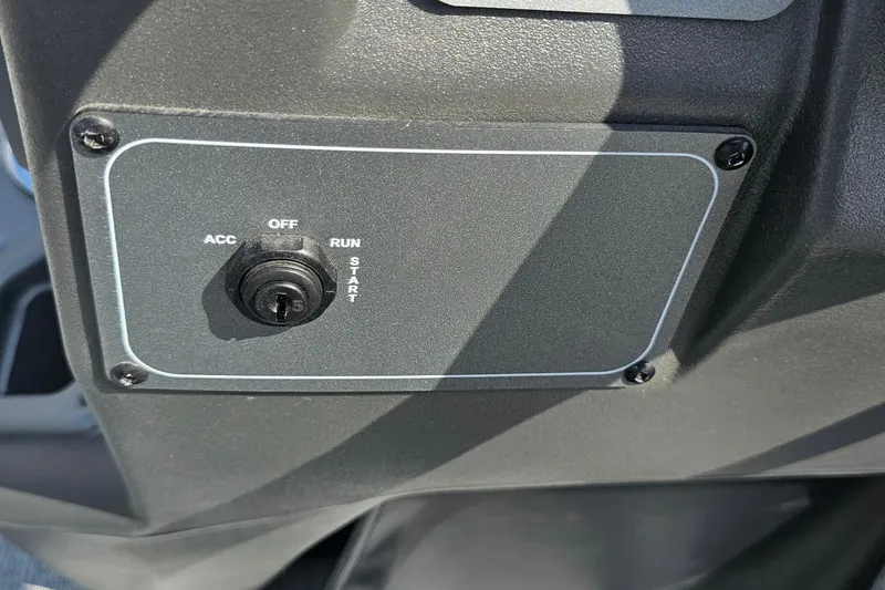 Slide: The Image of Ignition switch panel on 2026 Sun Tracker Bass Buggy 18 DLX boat dashboard. - 17