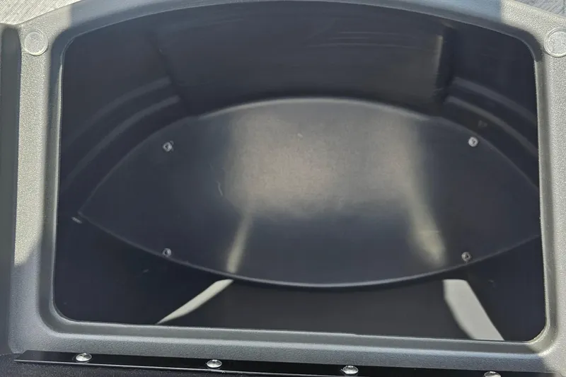 Slide: The Image of Storage compartment of 2026 Sun Tracker Bass Buggy 18 DLX boat, featuring durable construction. - 9