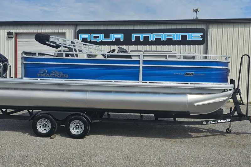 The Image of 2026 Sun Tracker Fishin' Barge 20 DLX pontoon boat at Aqua Marine dealership. - 0