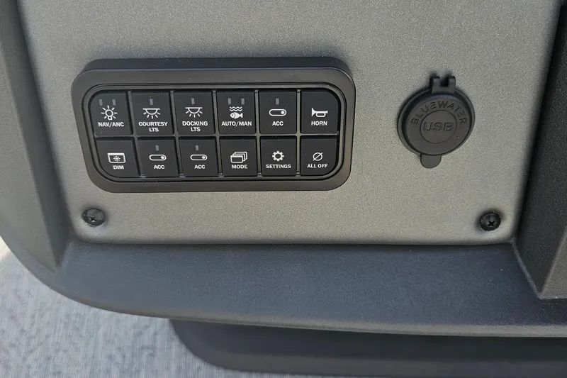 Slide: The Image of Control panel of 2026 Sun Tracker Fishin' Barge 20 DLX with USB port. - 16