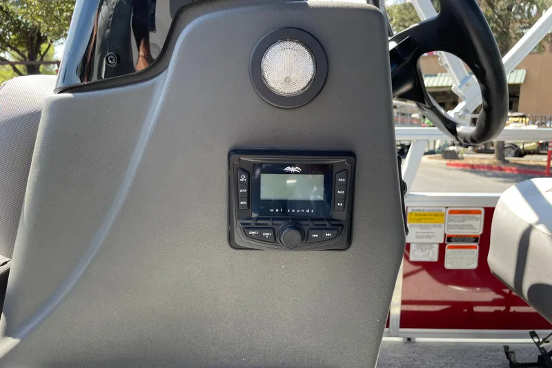 Slide: The Image of Control panel of 2026 Sun Tracker Bass Buggy 16 XL Select with audio system. - 20