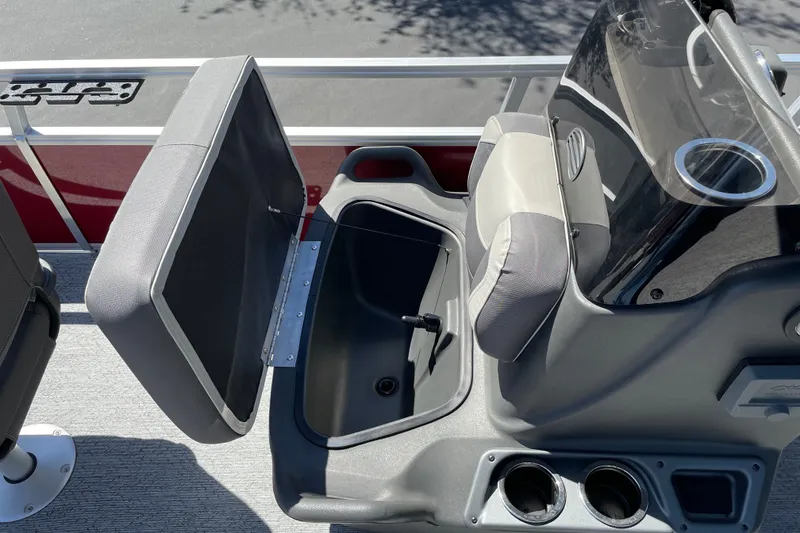 Slide: The Image of 2026 Sun Tracker Bass Buggy 16 XL Select boat seat with storage compartment open. - 19