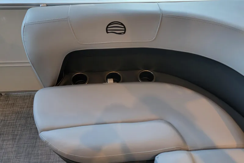 Slide: The Image of 2026 Sun Tracker Party Barge 16 DLX interior seating with cup holders. - 46