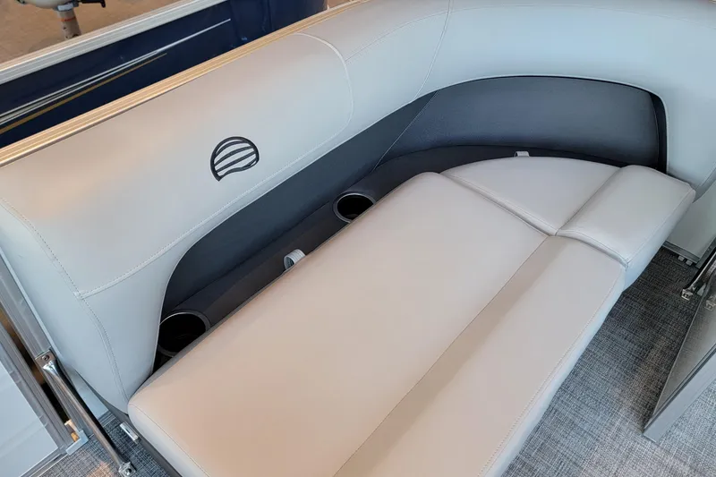 Slide: The Image of 2026 Sun Tracker Party Barge 16 DLX interior seating with cup holders. - 48