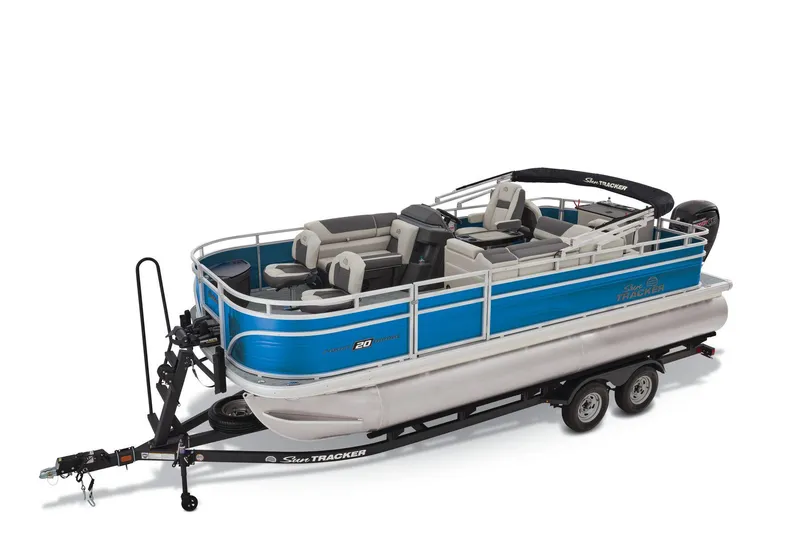 The Image of 2026 Sun Tracker Fishin' Barge 20 DLX pontoon boat outside Bass Pro Shops Outdoor World. - 0