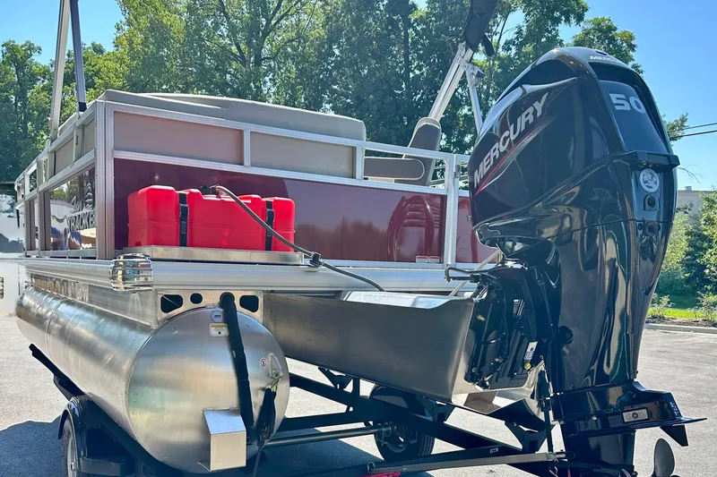 Slide: The Image of 2026 Sun Tracker Bass Buggy 16 XL Select pontoon boat with Mercury 50 engine. - 74